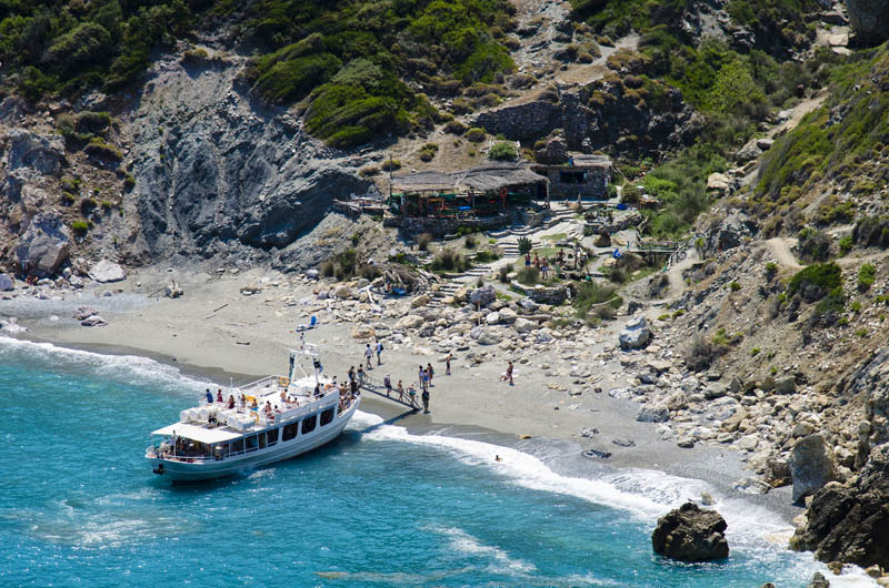 Tourist,Boat,Landing,On,The,Beach,Of,Kastro,At,Skiathos